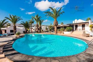 Bazén v ubytování Casita Luna VV Playa Bastian nebo v jeho okolí