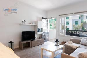 TV a/nebo společenská místnost v ubytování Casita Luna VV Playa Bastian