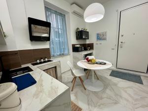 Køkken eller tekøkken på Appartamento a Genova con parcheggio privato a due passi dal mare