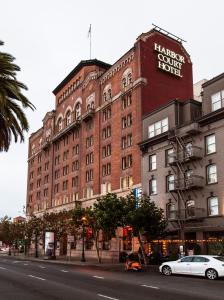 a large red brick building with a harrods court hotel at Harbor Court Hotel in San Francisco