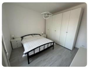Postel nebo postele na pokoji v ubytování Clapa house medium