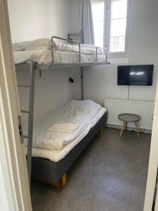 Postel nebo postele na pokoji v ubytování Faaborg Vandrerhjem