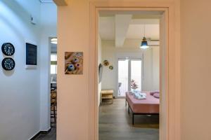 Postel nebo postele na pokoji v ubytování Kastella Bohemian Pied a Terre