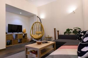 TV a/nebo společenská místnost v ubytování Kastella Bohemian Pied a Terre