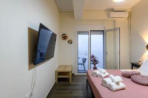 TV a/nebo společenská místnost v ubytování Kastella Bohemian Pied a Terre