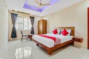 Postel nebo postele na pokoji v ubytování Collection O Champion Paradise