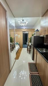 TV a/nebo společenská místnost v ubytování GoodVibes Condotel + 12 fotografií