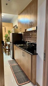 Kuchyň nebo kuchyňský kout v ubytování GoodVibes Condotel