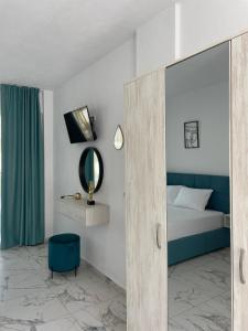 Postel nebo postele na pokoji v ubytování Emerald