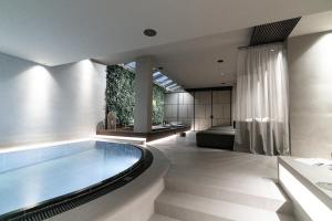 Bazén v ubytování Hotel Rigele Royal Superior nebo v jeho okolí