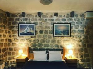 Postel nebo postele na pokoji v ubytování OldMarinerVilla