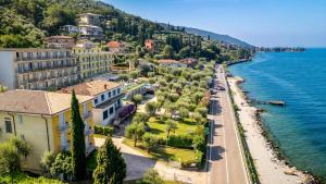 an aerial view of a town next to the water at Hotel Internazionale in Torri del Benaco