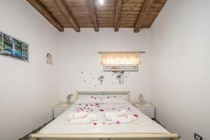 Katil atau katil-katil dalam bilik di La Casa di Sciù Sciù
