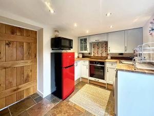 Køkken eller tekøkken på Wren Cottage North Norfolk