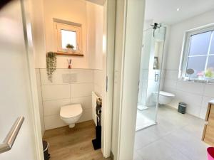 Koupelna v ubytování Appartements BERGTRAUM