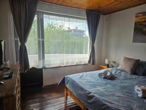 Postel nebo postele na pokoji v ubytování Вила Кула
