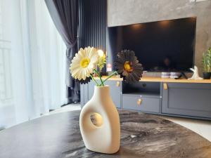 Μια τηλεόραση ή/και κέντρο ψυχαγωγίας στο Nilai KLIA Youth City Residence Fully AirCon Blissful Suite