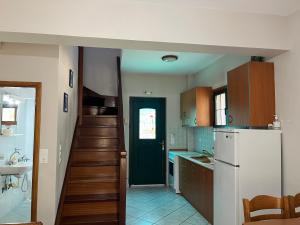 Kuchyň nebo kuchyňský kout v ubytování Annas Villa + 20 fotografií