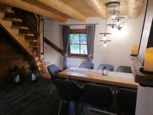 a meeting room with a table and chairs at Exclusive Forest House - Spiska Leśna Przystań in Łapsze Niżne