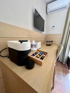 TV a/nebo společenská místnost v ubytování Studio confortable avec piscine
