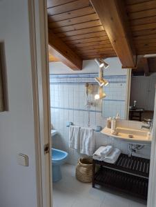 Koupelna v ubytování Hostal de la Plaça - Hotel Boutique