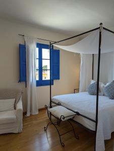 Postel nebo postele na pokoji v ubytování Hostal de la Plaça - Hotel Boutique