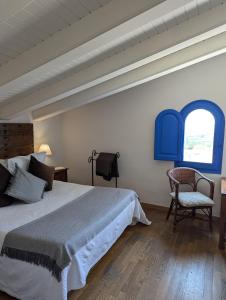 Postel nebo postele na pokoji v ubytování Hostal de la Plaça - Hotel Boutique