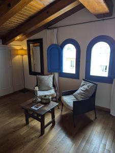 Posezení v ubytování Hostal de la Plaça - Hotel Boutique