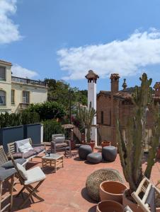 Zahrada ubytování Hostal de la Plaça - Hotel Boutique