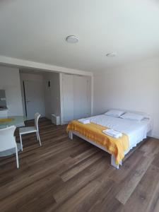 Postel nebo postele na pokoji v ubytování Apartmani Ribar
