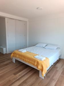 Postel nebo postele na pokoji v ubytování Apartmani Ribar