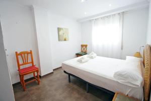 Łóżko lub łóżka w pokoju w obiekcie Xavier - oceanfront apartment with sea views in Calpe