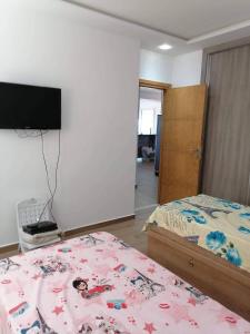 Postel nebo postele na pokoji v ubytování Leila