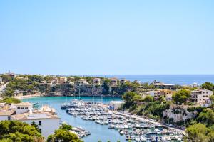 a view of a harbor with boats in the water at Hotel Ankaa - Adults Only in Porto Cristo