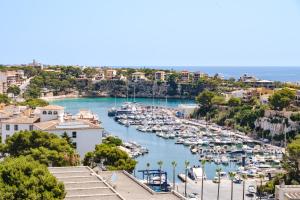 a view of a harbor with boats in the water at Hotel Ankaa - Adults Only in Porto Cristo