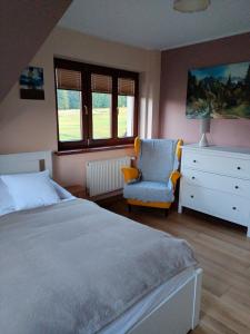 Posteľ alebo postele v izbe v ubytovaní Apartament Rojka