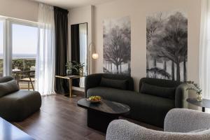 Posezení v ubytování Cali Resort & Spa Designed For Adults by Louis Hotels