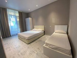 Katil atau katil-katil dalam bilik di nira hotel