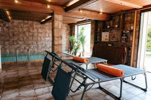 a dining room with a table and chairs at Big quiet Villa with garden and pool in Vienna