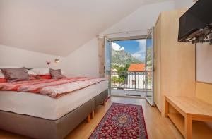 Кровать или кровати в номере Apartmani Galić 2