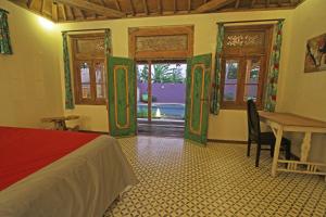 Postel nebo postele na pokoji v ubytování Guesthouse Mooz