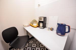 Příslušenství pro přípravu čaje a kávy v ubytování Unirii Suites