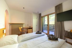 Voodi või voodid majutusasutuse Hotel Rommisa toas