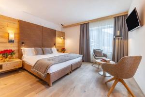 TV a/nebo společenská místnost v ubytování Hotel Meida