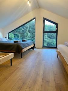 Postel nebo postele na pokoji v ubytování Tiny house & AC