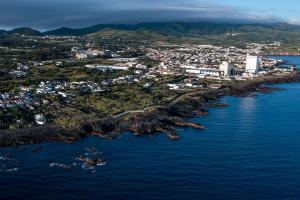 an aerial view of a small island in the water at Casa Gabriel Barbosa in Lagoa
