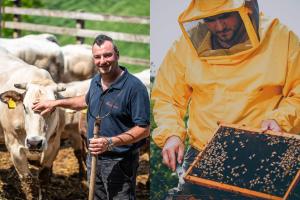 a man in a raincoat standing next to a cow at La Casina in Casteggio
