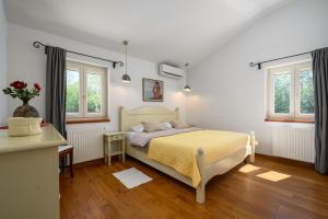 Posteľ alebo postele v izbe v ubytovaní Villa Lipa + 37 fotografií