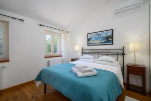 Posteľ alebo postele v izbe v ubytovaní Villa Lipa