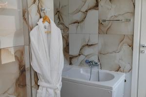 Ein Badezimmer in der Unterkunft Riviera Hotel-City Center